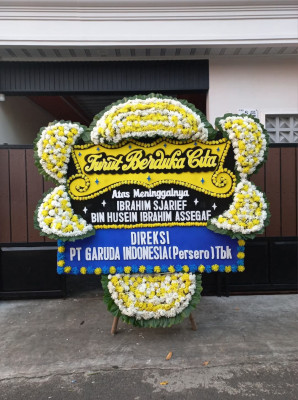 Papan Bunga Duka di Persiakan