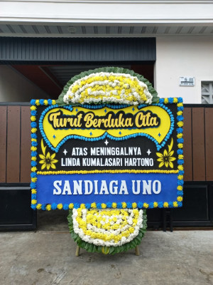 Papan Bunga Duka di Persiakan